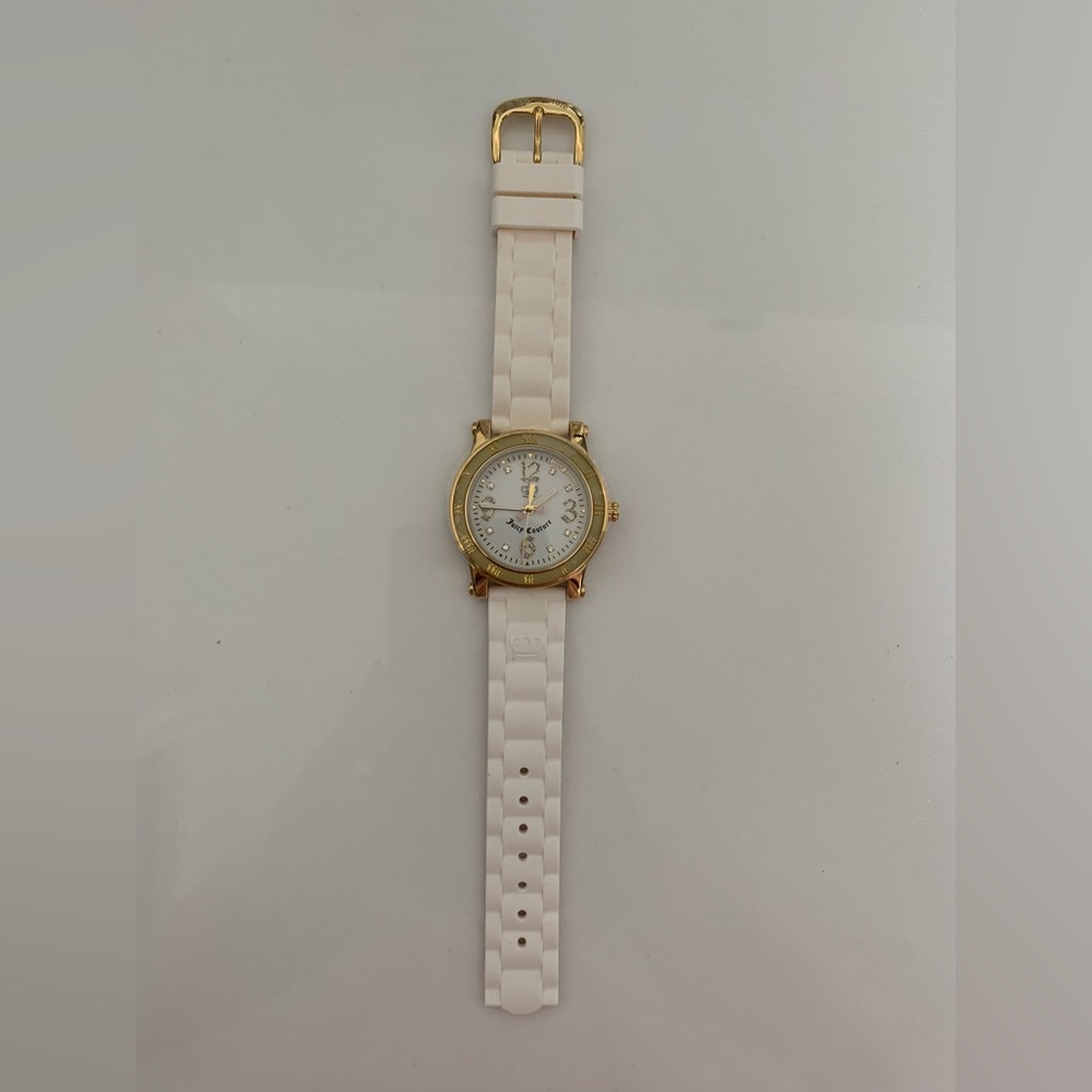 Juicy Couture watch. Mint condition. No scratches, flexible rubber wrist band.